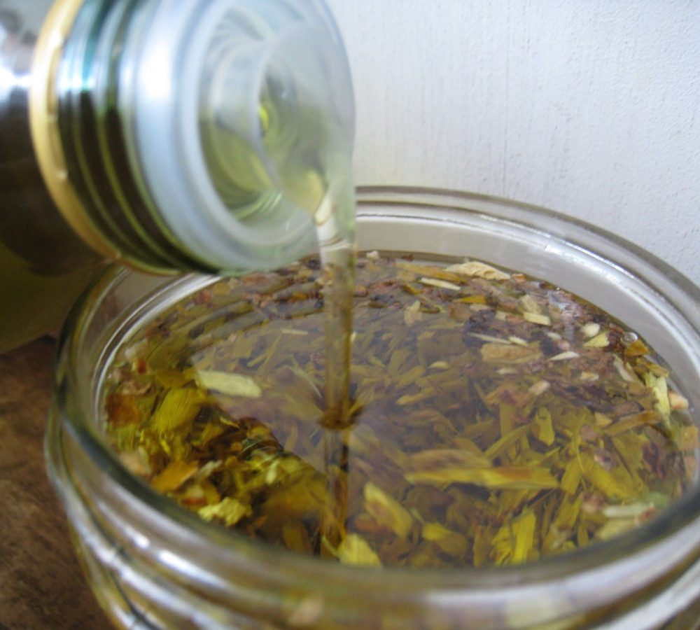 Creating a Kitchen Pharmacy: How to Make an Herb Infused Medicinal Oil
