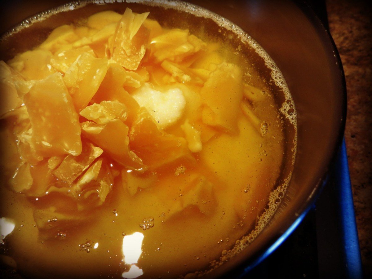 melting beeswax and tallow for candlemaking by frugally sustainable